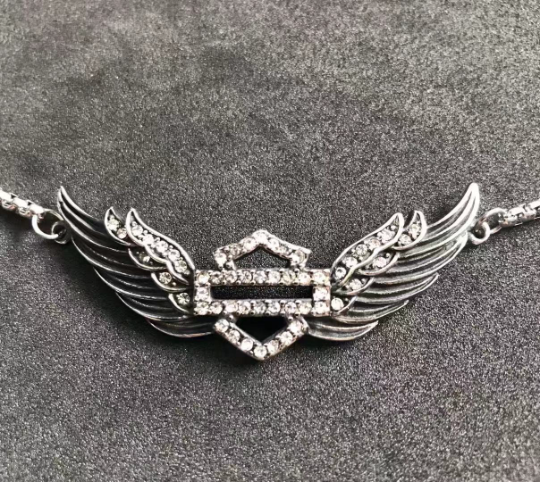 Harley Wings Elegance Necklace: Timeless Design with White Jewelry Accents